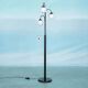 Minimalist floor lamp in glass, space age style.