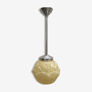Art deco pendant light with "diamond" glass sphere
