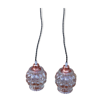 Pair of moulded glass suspensions