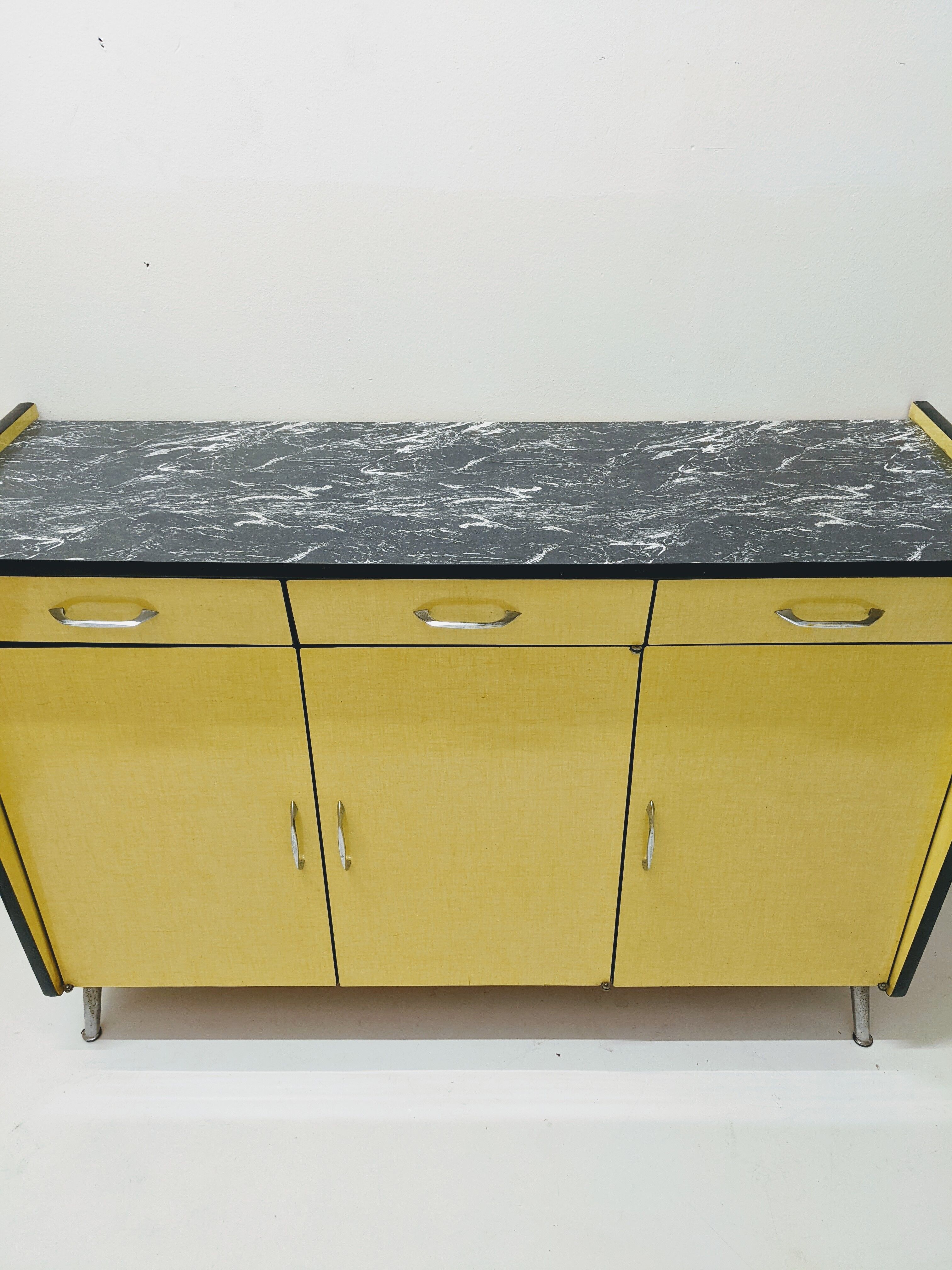 Vintage in-row sideboard in yellow formica