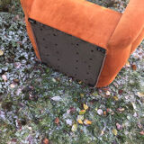 Orange velvet armchair