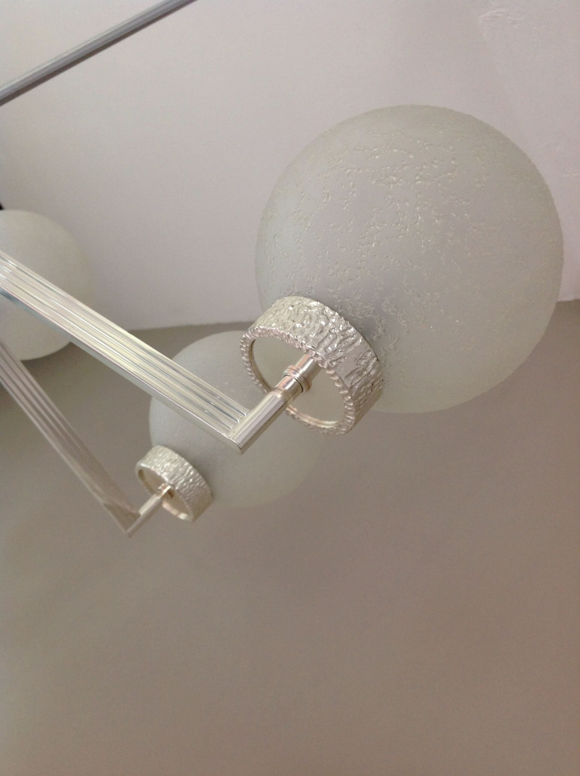 Six-light chrome metal chandelier and opaque glass globes / vintage 60s and 70s