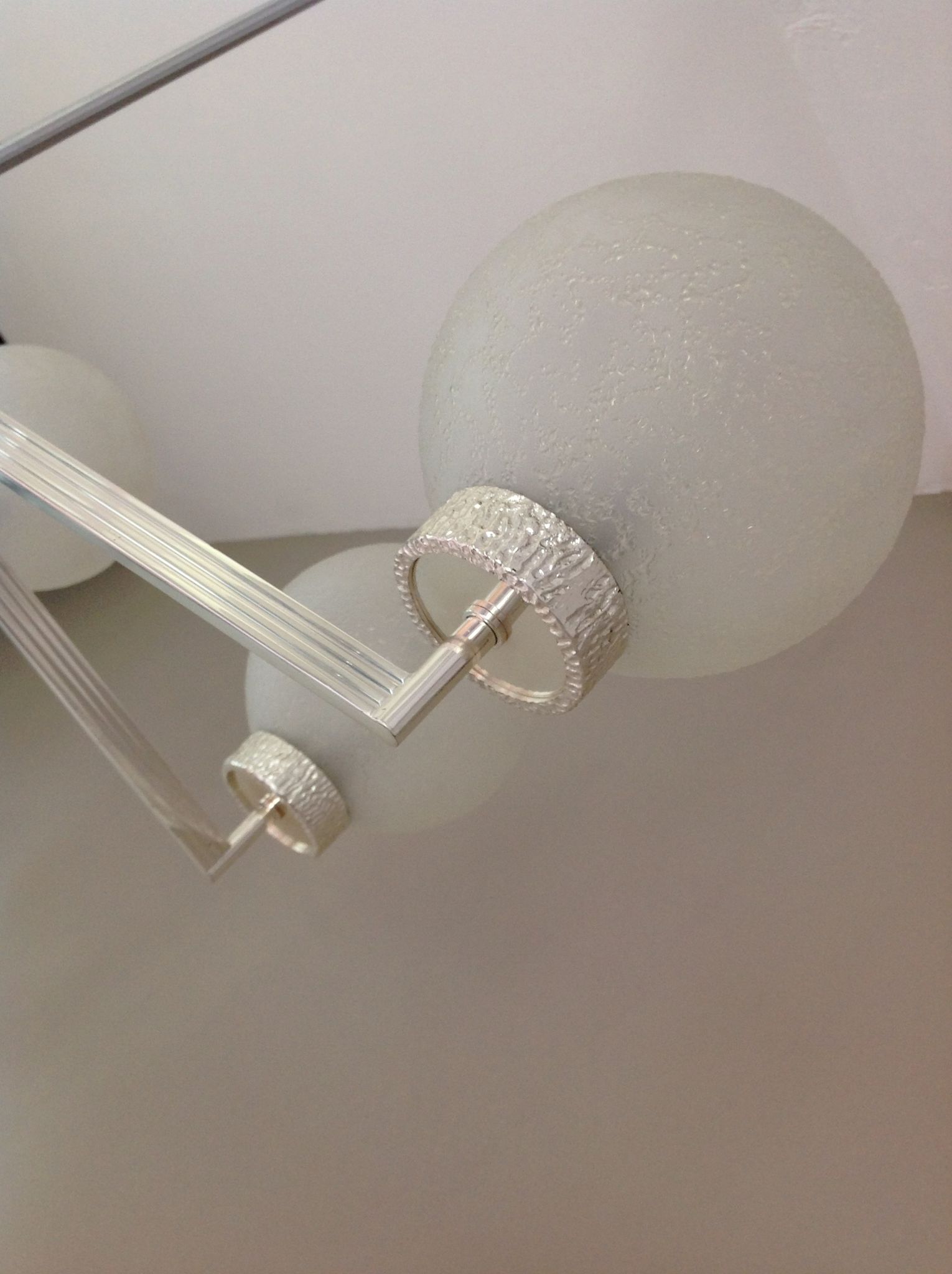 Six-light chrome metal chandelier and opaque glass globes / vintage 60s and 70s