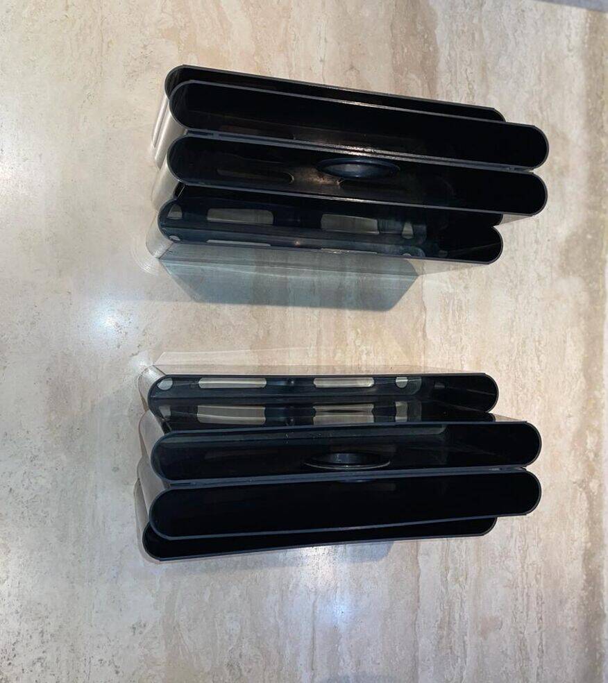 Black “Kartell” magazine rack by Giotto Stoppino, Italy 1970