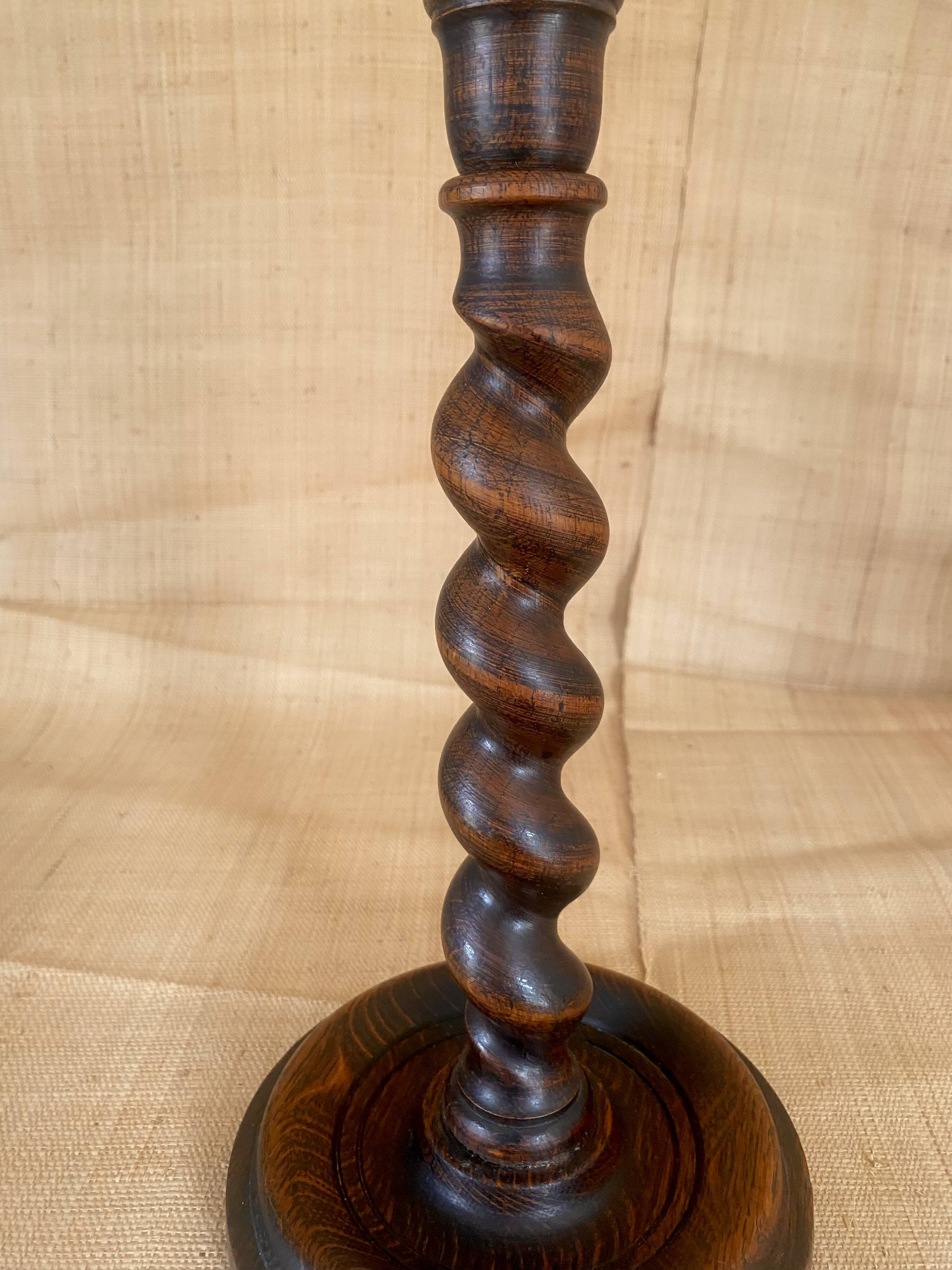 Turned wooden lamp base, fabric cable