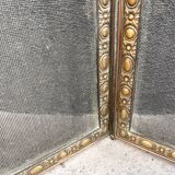 Antique fireplace screen in copper and brass from the 19th century.