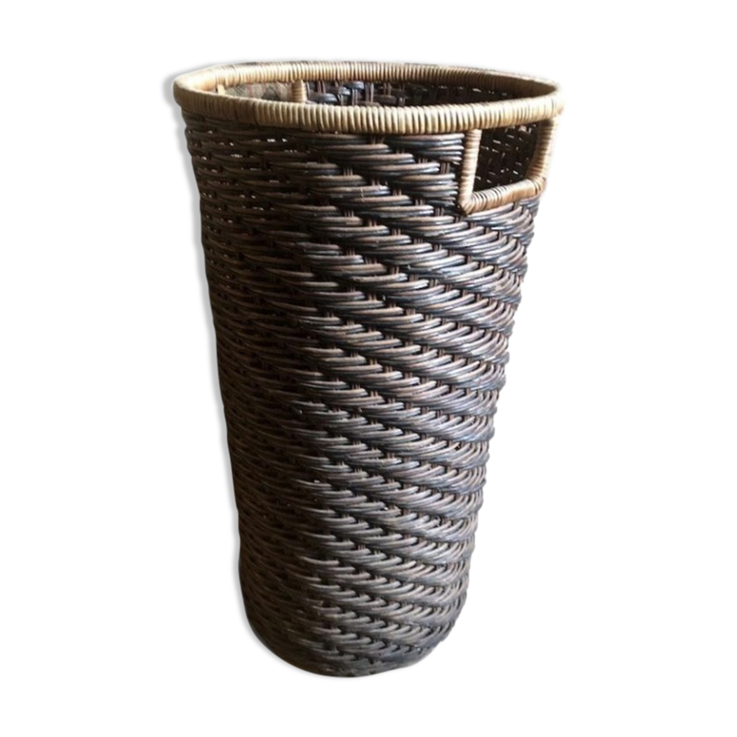 High basket in braided wicker