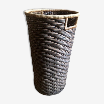 High basket in braided wicker