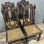 Set of 4 Renaissance style hunting lodge chairs in carved oak