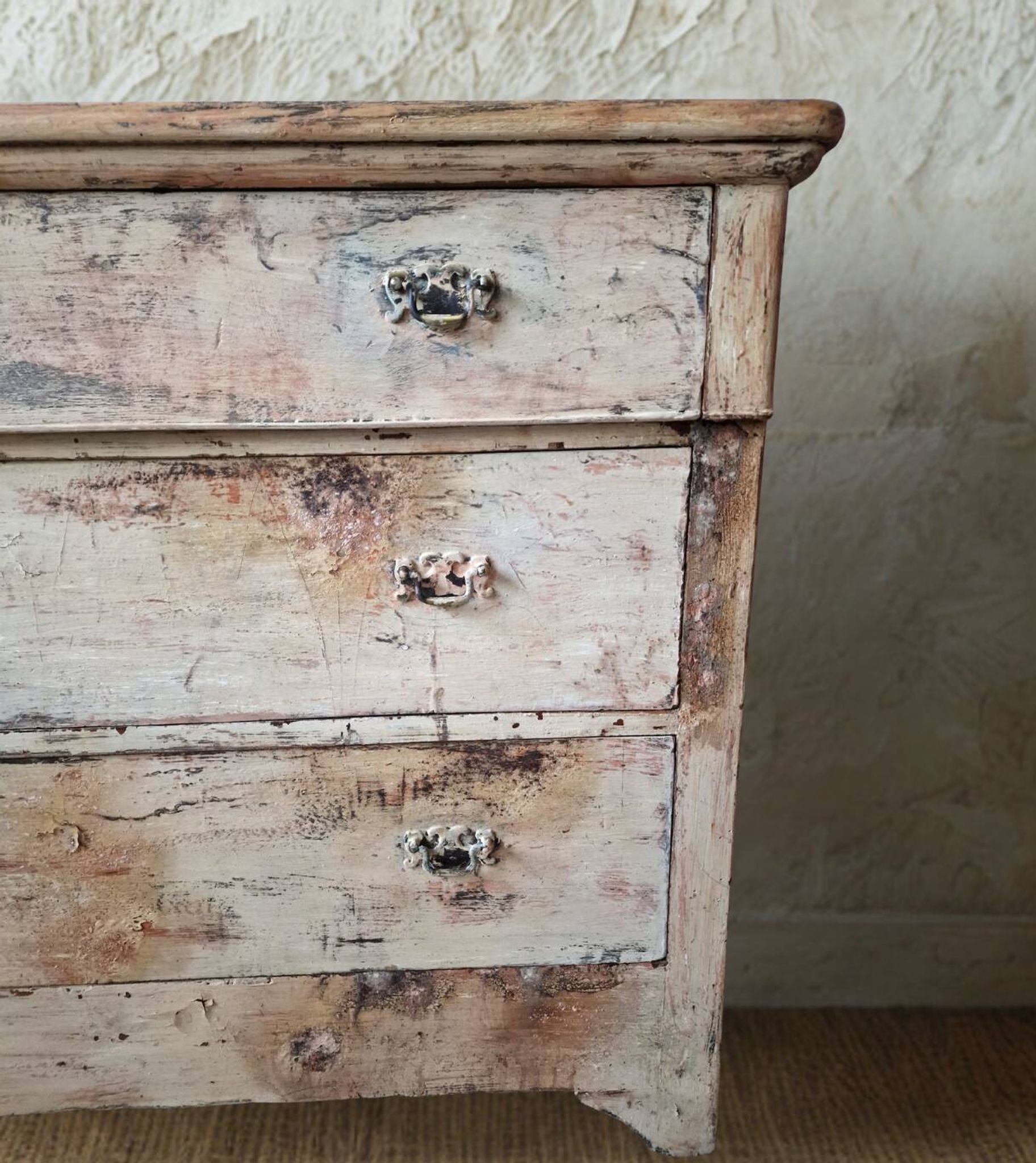 Antique patinated chest of drawers