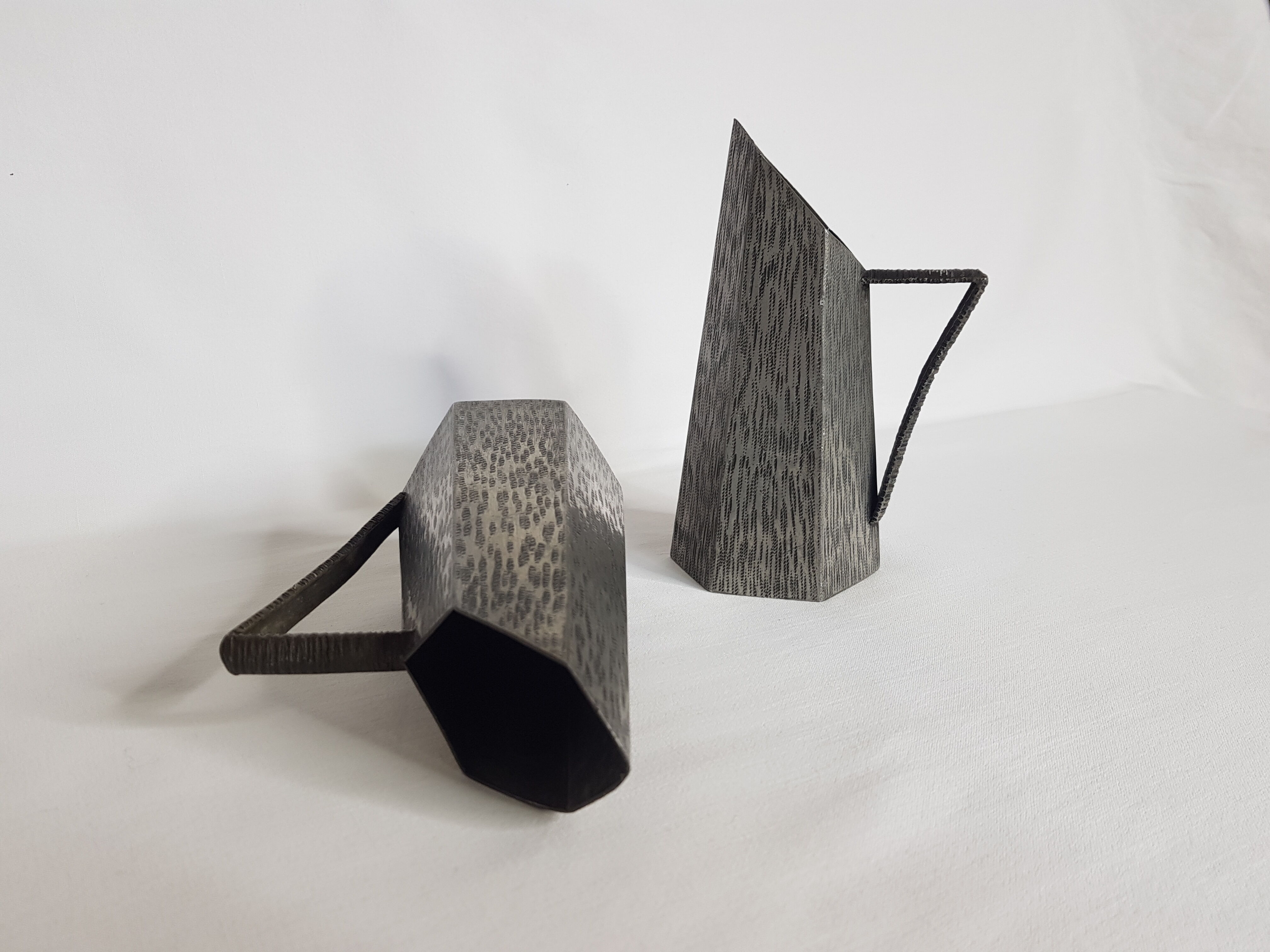 Two small vases of art textured original design Irman pewter