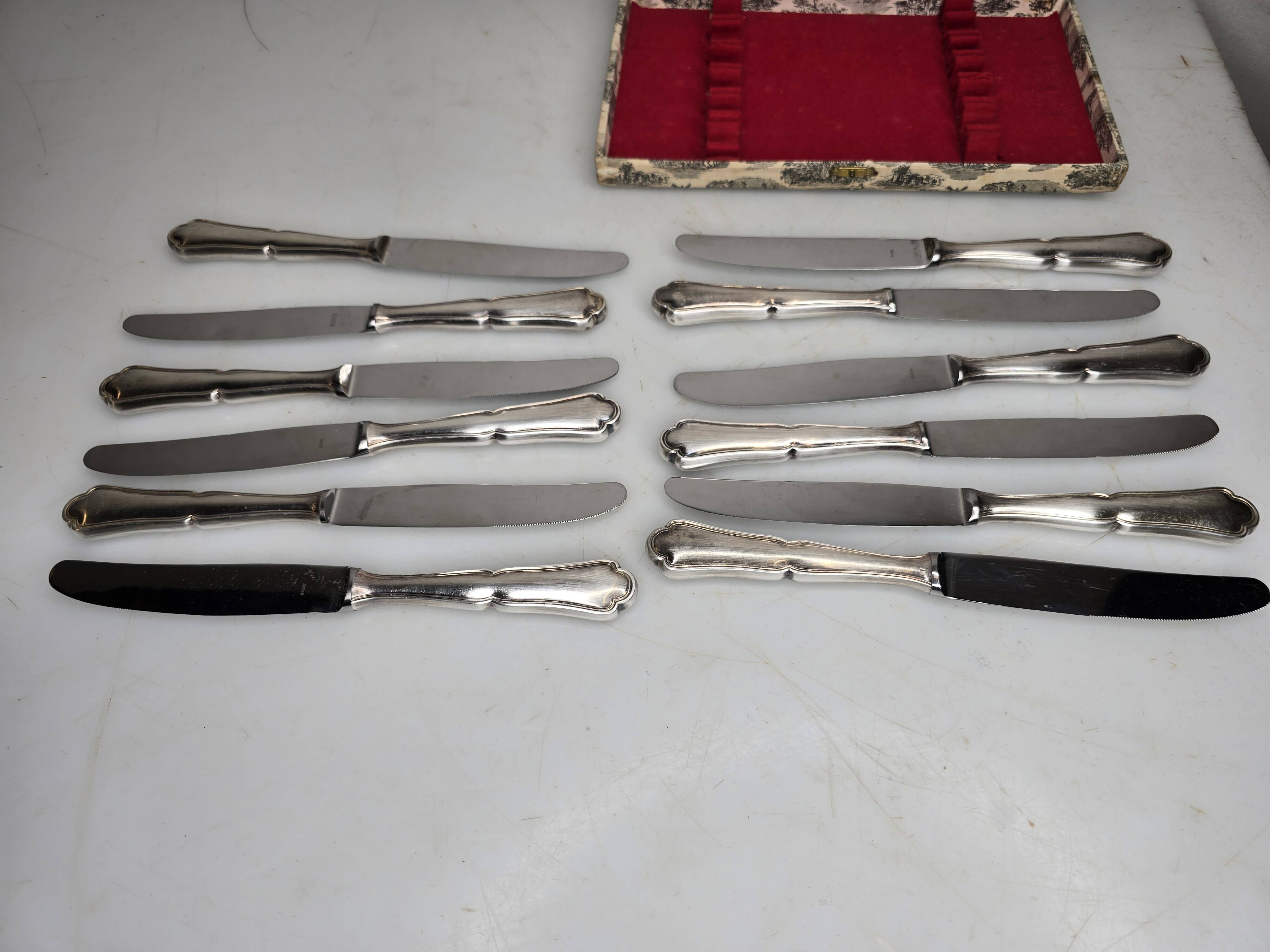 12 silver-plated knives mid-15th century