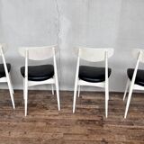 Series of 4 white and black Scandinavian chairs Ingrid from Stella 1960.
