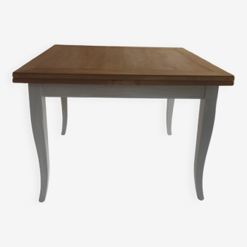 Beautifully crafted table with Italian-style extensions, pearl gray patinated base.