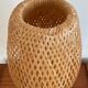 Design lamp in gold metal and wicker