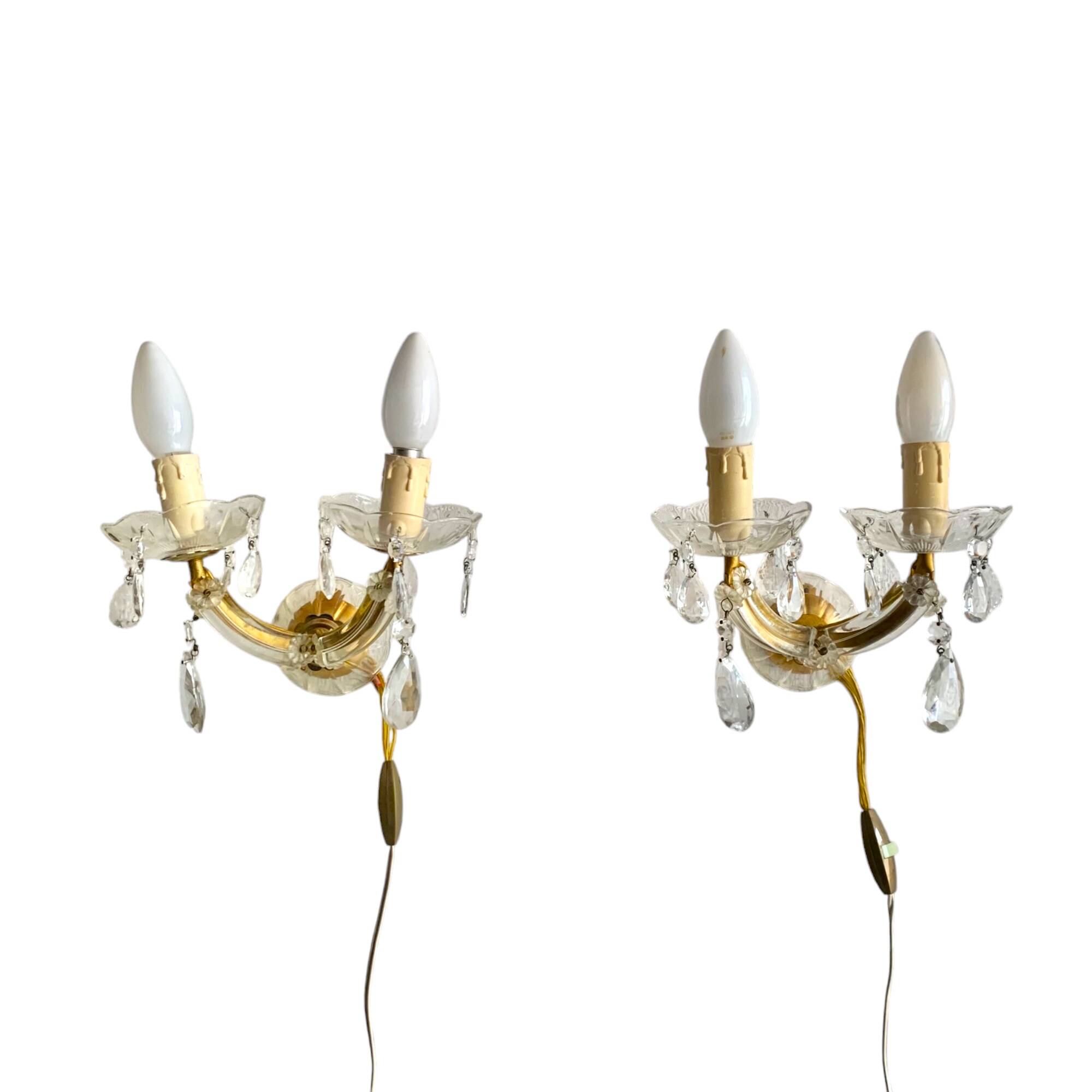"Pair of vintage glass and brass wall sconces with tassels