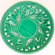 Openwork XL dish in green slurry like olive branches