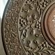 Ancient oriental pedestal table in carved wood