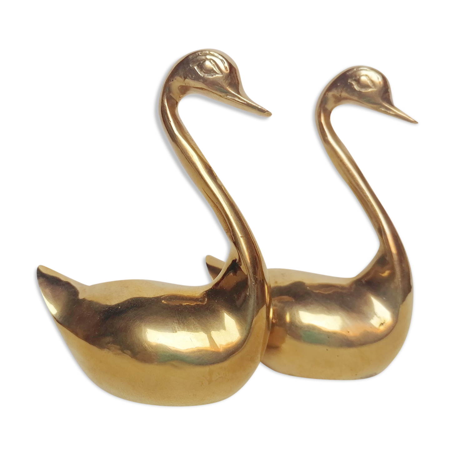 Two ducks made of solid brass