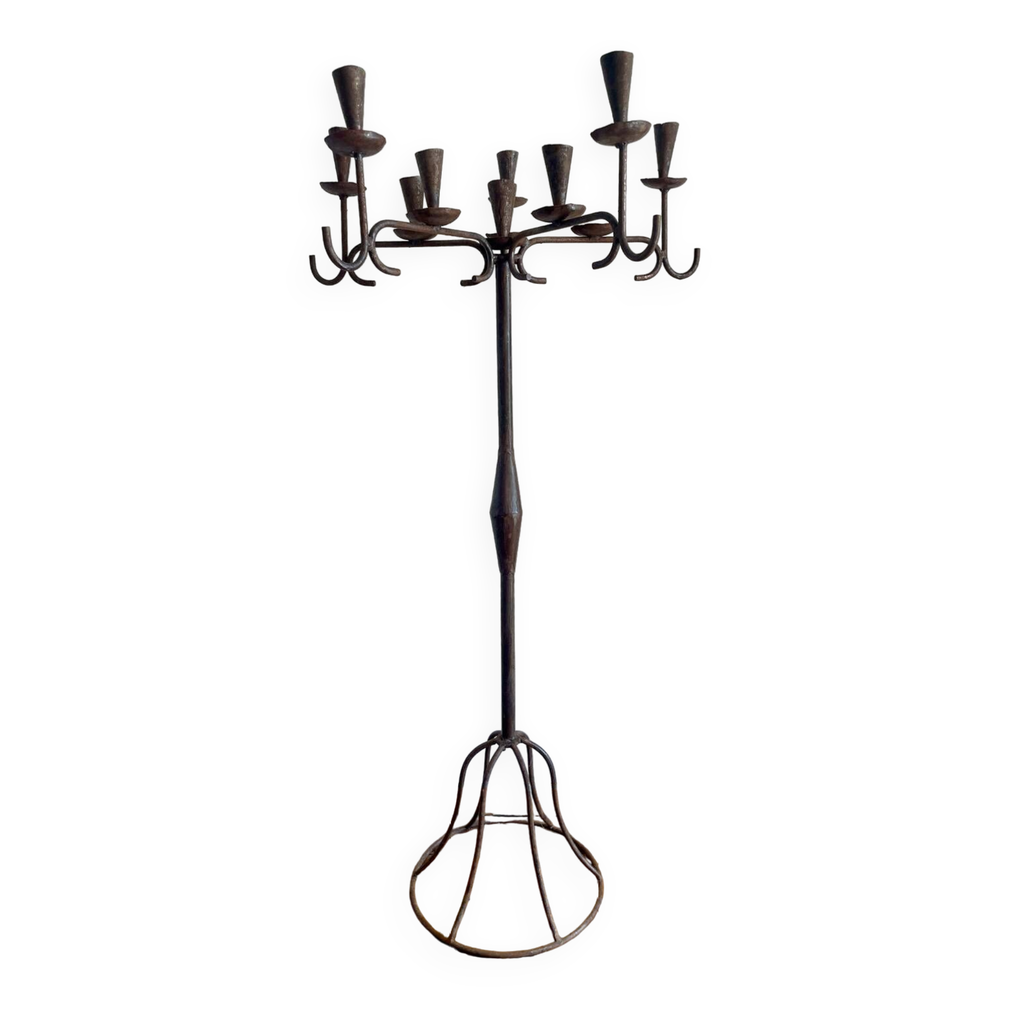 Large standing candlestick in folk art forged metal