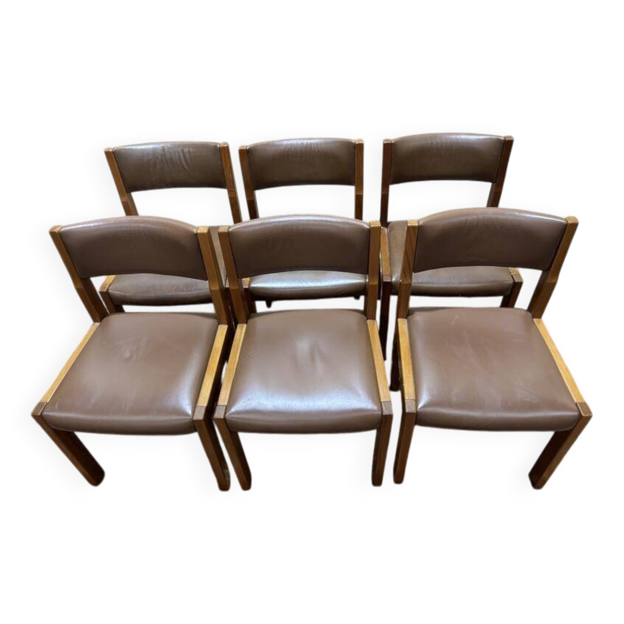 Série de 6 chaises dans le goût de Regain assises cuir