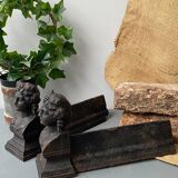 Pair of cast iron pegs