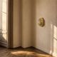 Geometric wall light in brass and glass, 1980s.