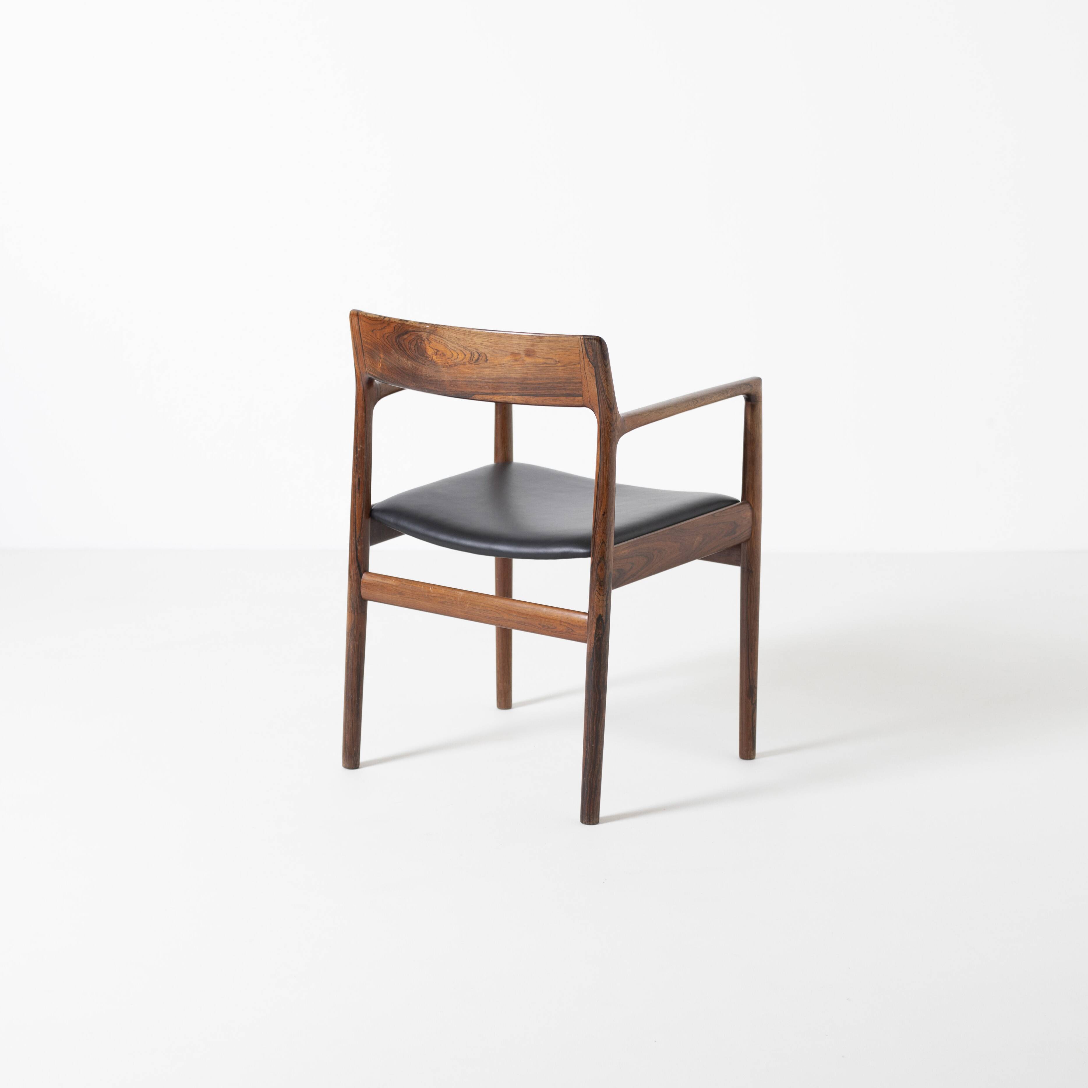 Armchair in rosewood and black leather, by J. Norgaard, Denmark, 1960s