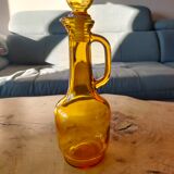 Yellow decanter with handle and spout
