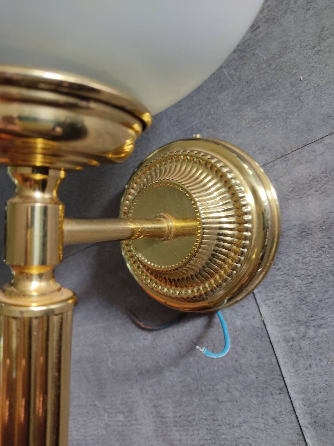 Pair of Art Deco style wall lights in brass and milk glass Sölken Leuch