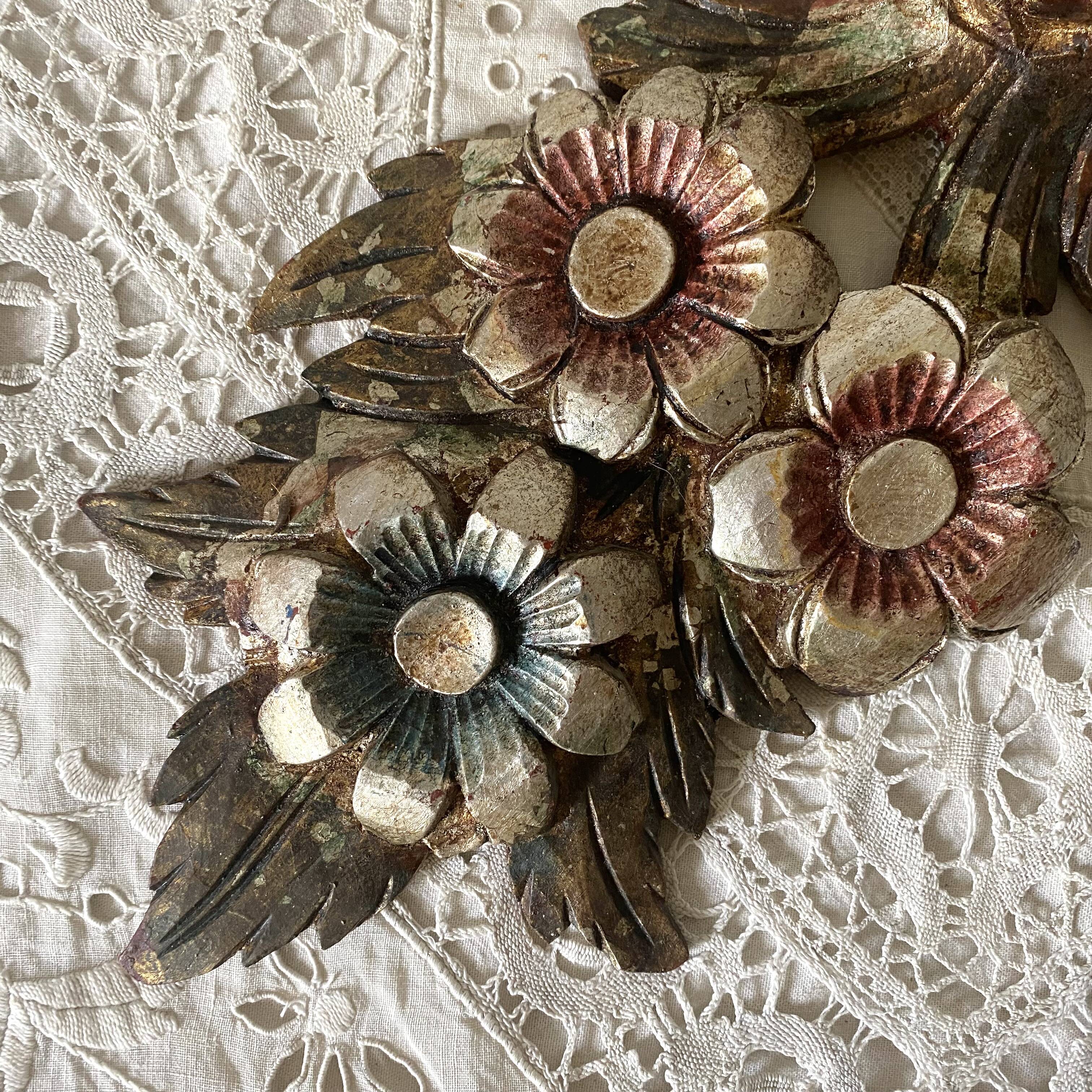 Decorative carved wooden ornament bouquet flowers and ribbon