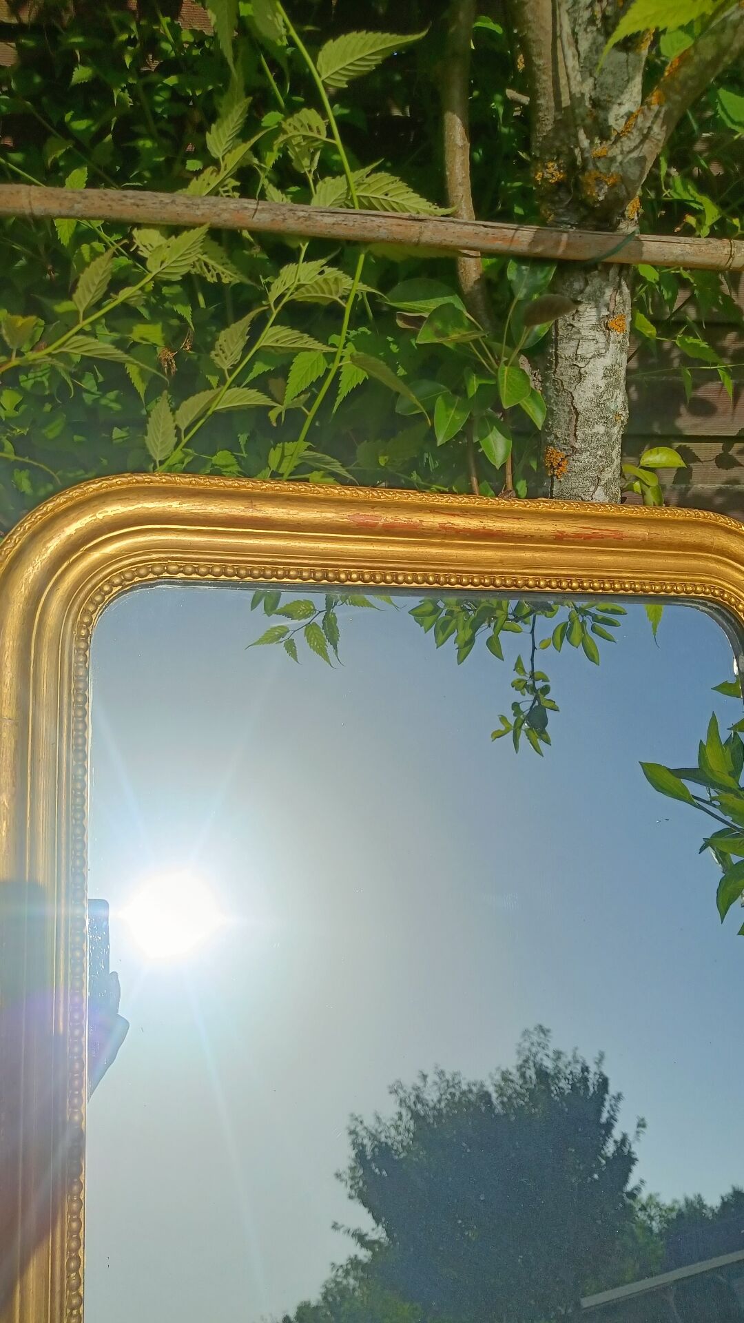 Antique gilded patinated Louis-Philippe mirror