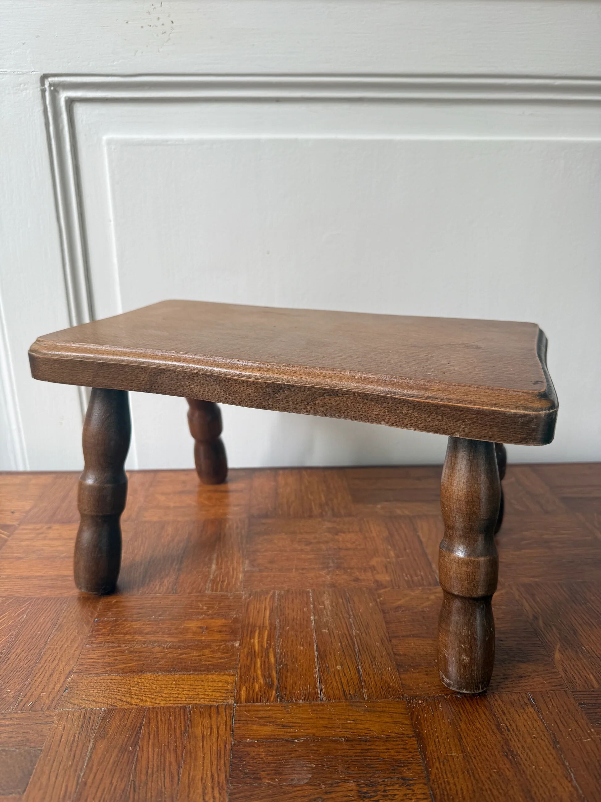 Old wooden milking stool