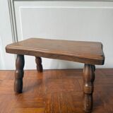 Old wooden milking stool