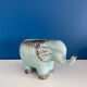 Enamelled elephant pot cover
