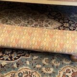 Long rustic footrest on ball feet