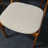 A set of four vintage teak dining chairs