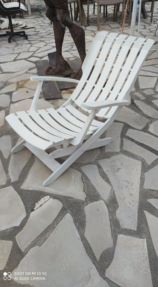 Four Grosfillex armchairs