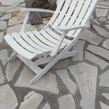 Four Grosfillex armchairs