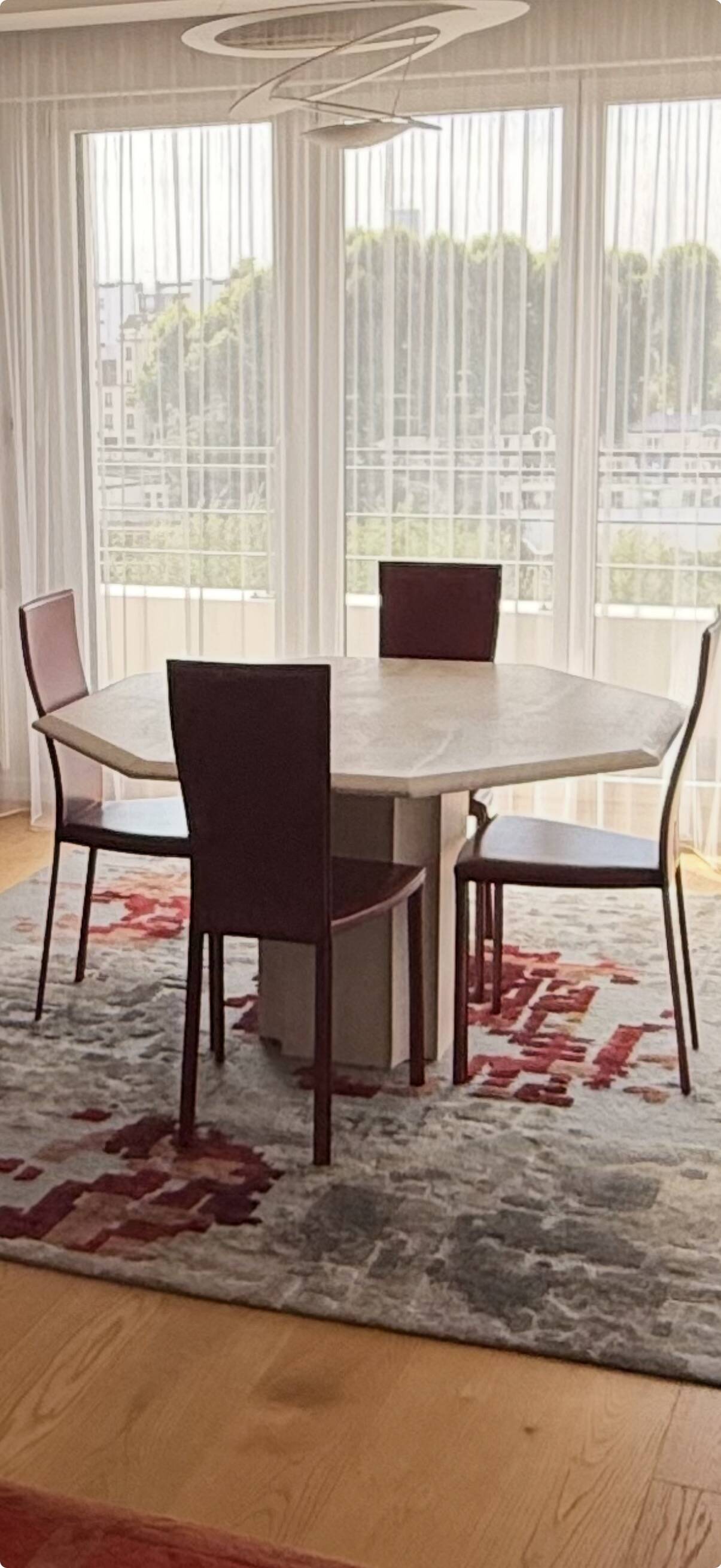 Table octogonale en travertin 130 cm Artelano état neuf