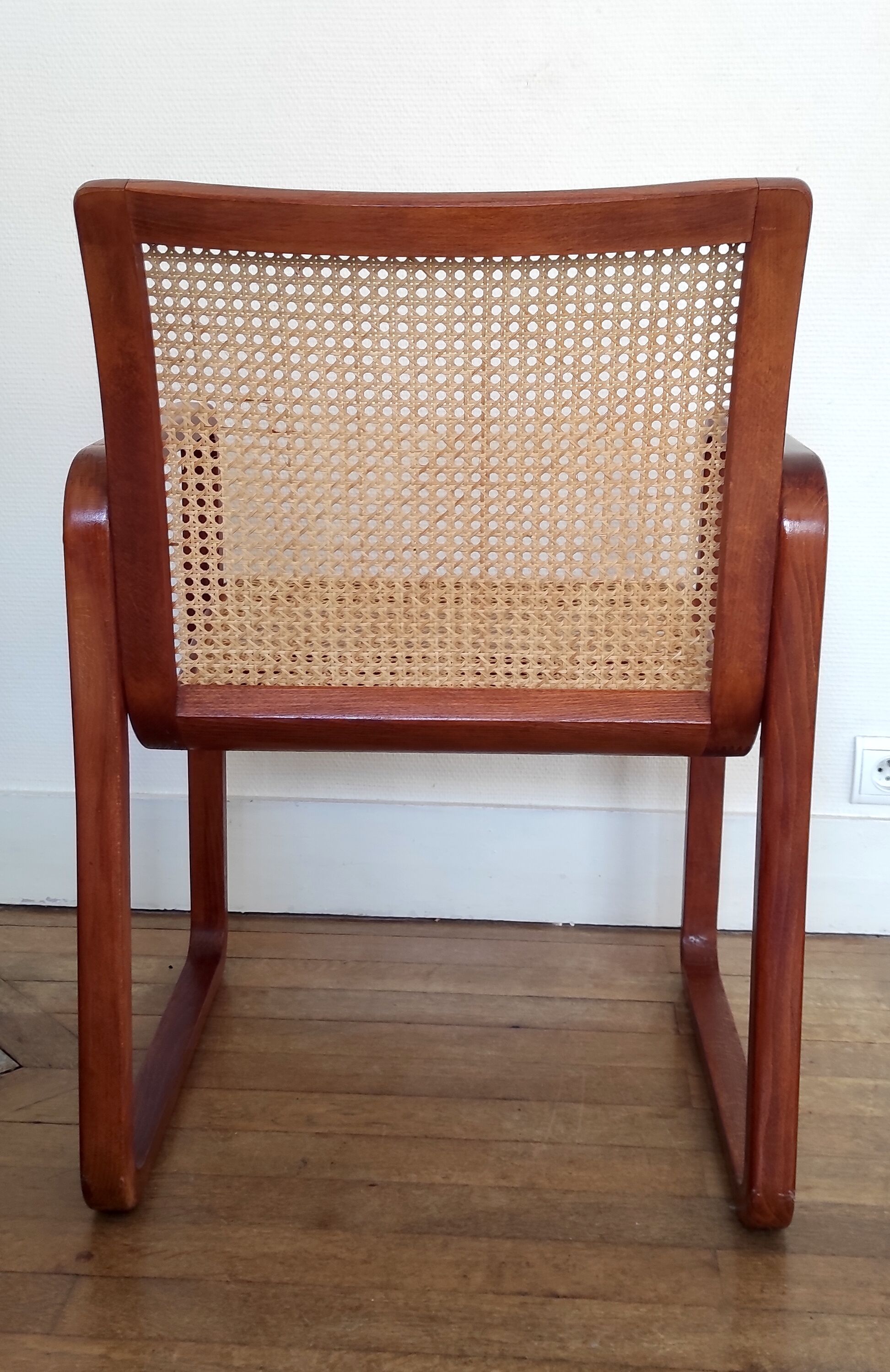 Fauteuil design traineau bois et cannage – années 80