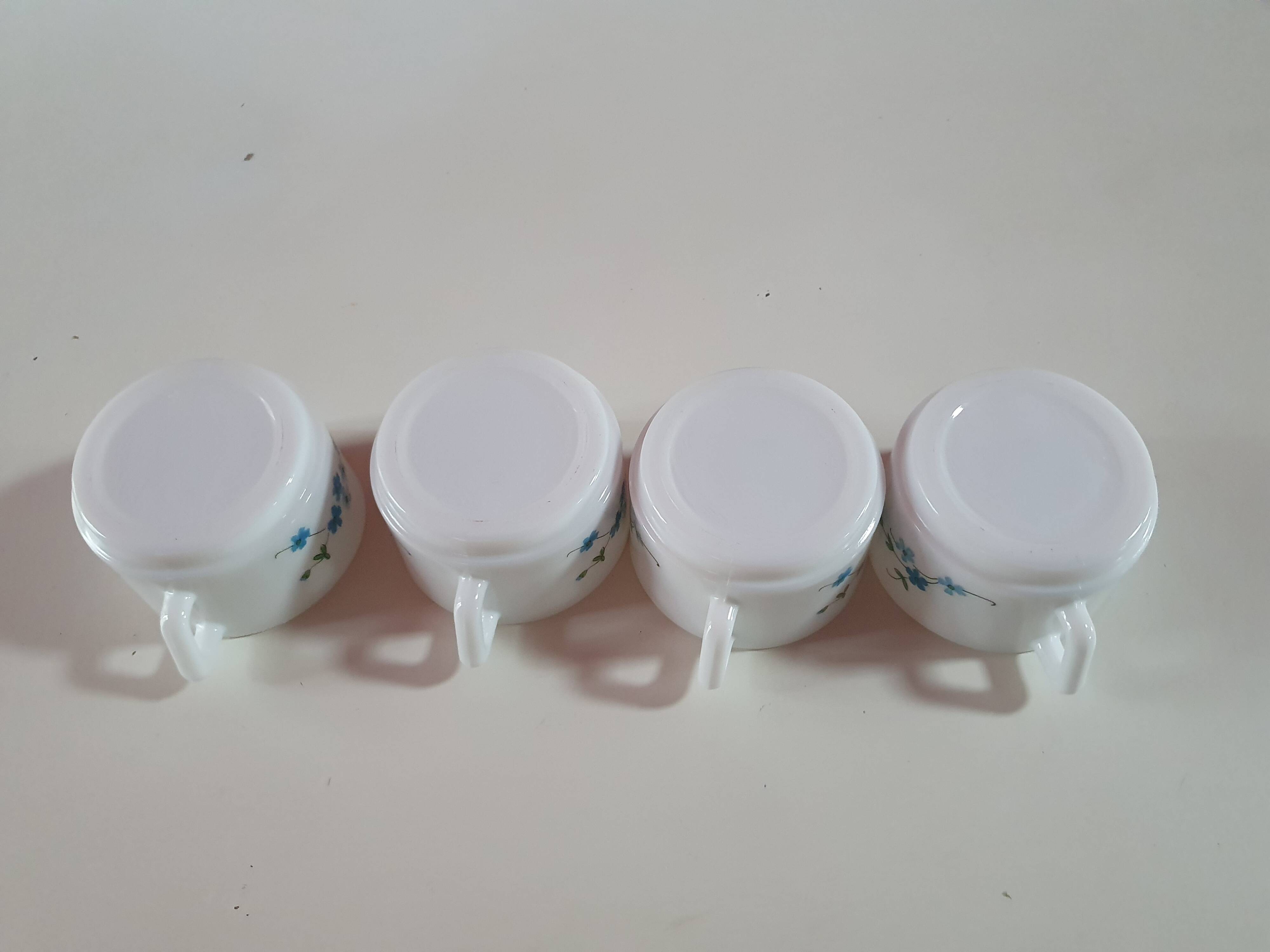 set of 4 vintage arcopal cups with small mysotis blue flowers