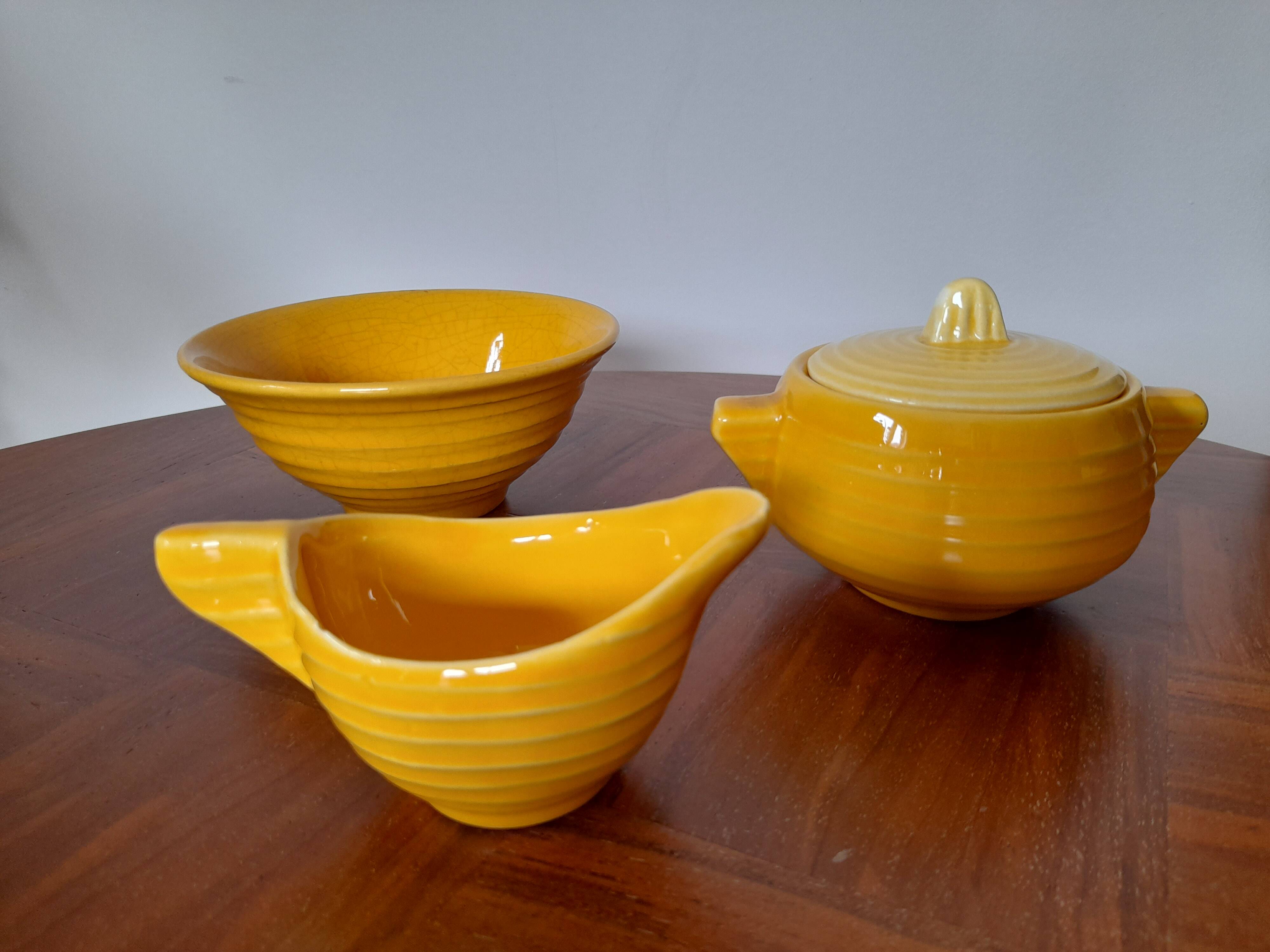 Antique yellow earthenware tea set