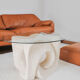 A Vintage White Stone Coffee Table with Glass Table Top