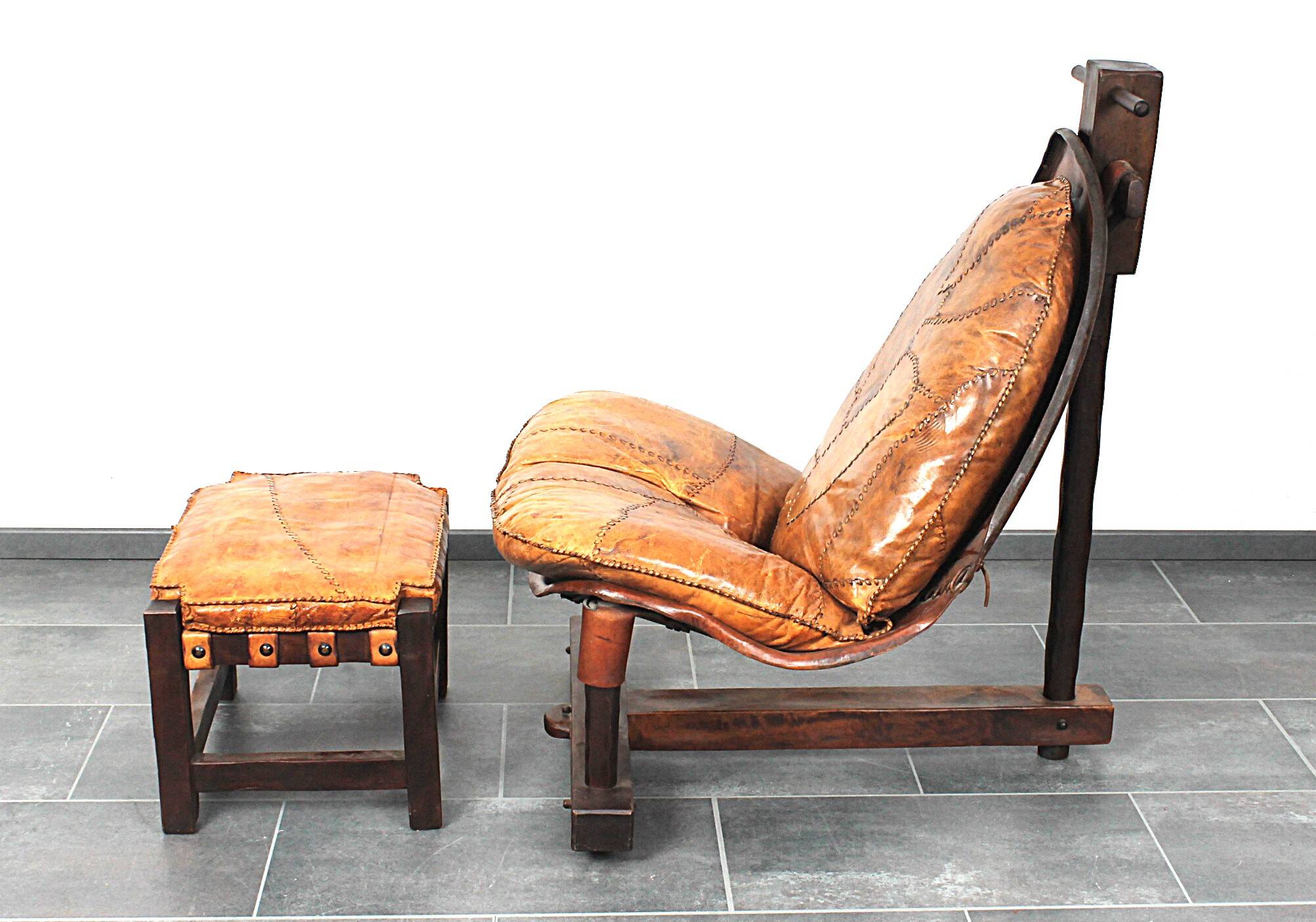 Brutalist oak lounge chair and ottoman, 1970s, set of 2