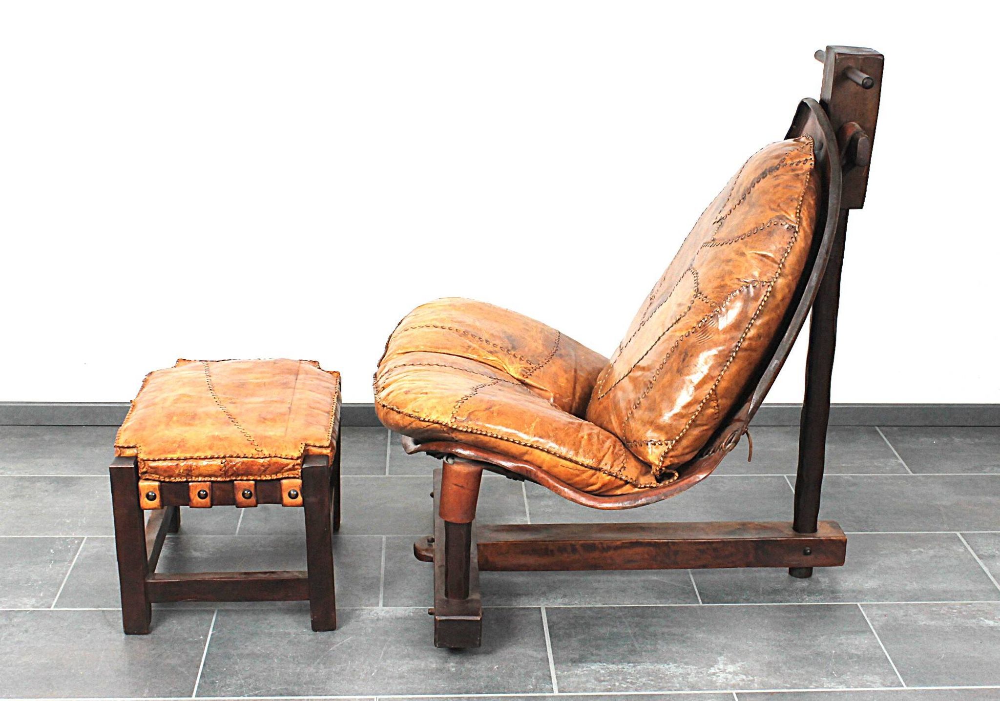 Brutalist oak lounge chair and ottoman, 1970s, set of 2