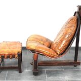 Brutalist oak lounge chair and ottoman, 1970s, set of 2