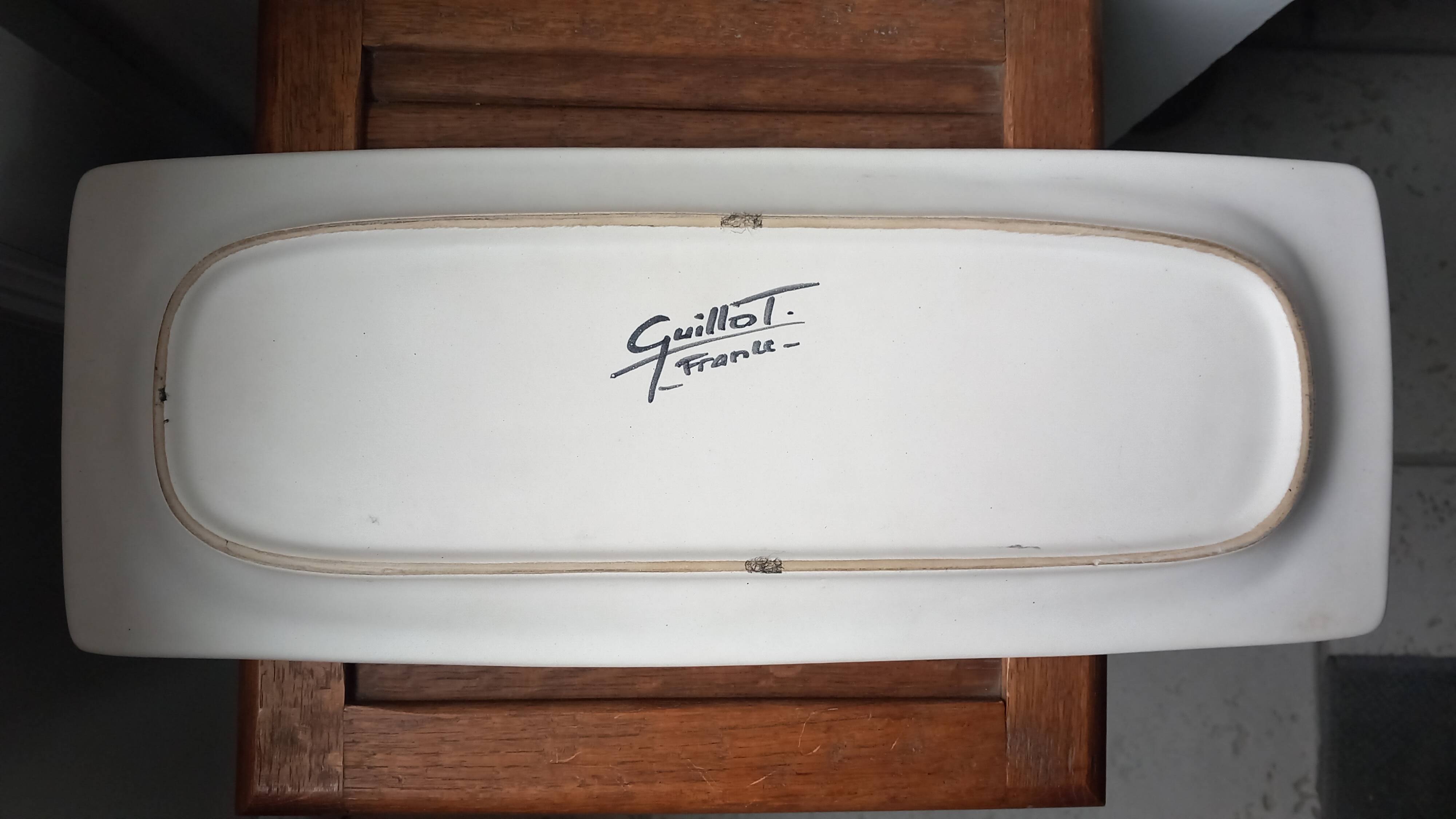 Dish signed Guillot France in ceramic