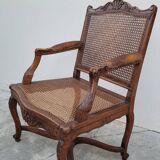 Louis XV Regency cane armchair leather armrests decorated with shell