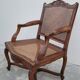 Louis XV Regency cane armchair leather armrests decorated with shell
